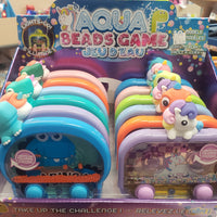 Unicorn/ Dino Aqua Ring Bead Game